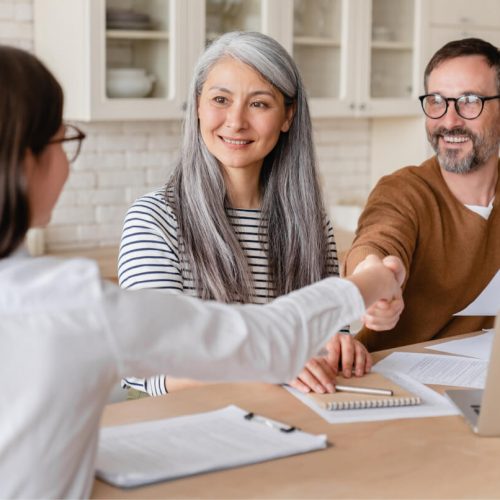 happy-mature-middle-aged-family-couple-clients-sig.jpg
